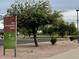 Sign to Red Mountain Park and Sportfield Complex in a well-maintained community park at 6614 E Portia St, Mesa, AZ 85215