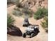 Open desert trail on a sunny day, perfect for off-road vehicles and adventure at 6614 E Portia St, Mesa, AZ 85215