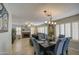 Elegant dining room featuring plantation shutters and an open floorplan at 6614 E Portia St, Mesa, AZ 85215