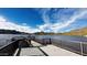 Scenic view of a lake pier with mountain views on a beautiful sunny day at 6614 E Portia St, Mesa, AZ 85215