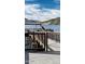 Bird perched on a pier over a lake with mountains in the background on a sunny day at 6614 E Portia St, Mesa, AZ 85215