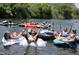 Relaxing Salt River tubing with friends offers an active lifestyle with mountain and river views at 6614 E Portia St, Mesa, AZ 85215