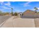 Well-kept single-Gathering home, featuring a desert landscape, an attached garage, and sidewalk access at 6913 E Kings Ave, Scottsdale, AZ 85254