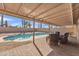 Inviting pool with a covered patio area, perfect for outdoor relaxation and entertainment at 6913 E Kings Ave, Scottsdale, AZ 85254