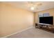 Bedroom showcasing neutral walls, carpet and ceiling fan at 7452 W Los Gatos Dr, Glendale, AZ 85310