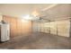 Spacious garage with ample built-in storage cabinets and an automatic door at 7452 W Los Gatos Dr, Glendale, AZ 85310