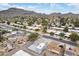 Scenic aerial view of a neighborhood nestled against a backdrop of majestic mountains at 1101 E Cheryl Dr, Phoenix, AZ 85020