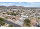 Aerial view showcasing the community, highlighting its well-connected streets, lush landscaping, and local shopping areas at 1101 E Cheryl Dr, Phoenix, AZ 85020