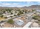 Community aerial shot featuring well-maintained homes, desert landscaping, and clear blue skies in a desirable neighborhood at 1101 E Cheryl Dr, Phoenix, AZ 85020