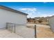 Fenced backyard features desert landscaping and distant mountain views at 1101 E Cheryl Dr, Phoenix, AZ 85020