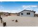 Rear view of a single-story home featuring updated paint and desert landscaping at 1101 E Cheryl Dr, Phoenix, AZ 85020