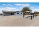 Lovely single-story home with a spacious driveway, carport, and desert landscaping at 1101 E Cheryl Dr, Phoenix, AZ 85020