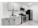 This kitchen features stylish cabinetry, stainless steel appliances, and modern countertops at 1101 E Cheryl Dr, Phoenix, AZ 85020