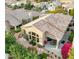 Aerial view of a home featuring a tile roof, landscaped backyard, and patio area at 11919 E Del Timbre Dr, Scottsdale, AZ 85259