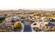 An aerial view shows the house and other houses in the area, including the landscape at 13102 S 177Th Dr, Goodyear, AZ 85338