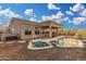 Inviting backyard pool and spa offers a relaxing retreat at 13102 S 177Th Dr, Goodyear, AZ 85338