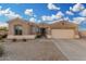 Charming single-story home features a desert landscape and a spacious two-car garage at 13102 S 177Th Dr, Goodyear, AZ 85338