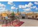 Outdoor patio with a built-in grill, seating area, and panoramic views, ideal for entertaining at 13102 S 177Th Dr, Goodyear, AZ 85338