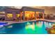 Stunning backyard featuring a pool, covered patio, and lounge area for ultimate outdoor enjoyment and relaxation at 13102 S 177Th Dr, Goodyear, AZ 85338