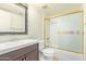 Bathroom with vanity, toilet, and shower/tub combo at 15402 N 28Th St # 201, Phoenix, AZ 85032