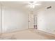 Empty bedroom with ceiling fan and natural lighting at 15402 N 28Th St # 201, Phoenix, AZ 85032