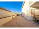 Large backyard area with an expansive stone patio at 16161 W Monte Cristo Ave, Surprise, AZ 85374