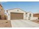 Attractive single-Gathering home with a two-car garage and a well-maintained driveway at 18248 W Carlota Ln, Surprise, AZ 85387