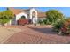 Stunning home showcasing an inviting entrance, beautiful landscaping, and a well-maintained exterior at 2020 E Norwood St, Mesa, AZ 85213