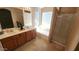 Bright bathroom features double sinks, a soaking tub, and a separate glass shower at 2303 E Wescott Dr, Phoenix, AZ 85024