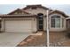 Charming single-story home featuring a two-car garage and a well-maintained front yard with desert landscaping at 2303 E Wescott Dr, Phoenix, AZ 85024