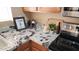 Stylish kitchen counter featuring granite countertops, wine rack, and modern appliances at 2303 E Wescott Dr, Phoenix, AZ 85024