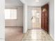 Inviting entryway with decorative tile flooring and a partially open wooden door at 2421 E Del Rio Dr, Tempe, AZ 85282