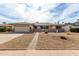 Charming single-story home with a two-car garage and beautiful desert landscaping at 2421 E Del Rio Dr, Tempe, AZ 85282