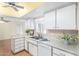 Functional kitchen featuring ample counter space and white cabinetry at 2421 E Del Rio Dr, Tempe, AZ 85282