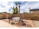 Outdoor patio space with pavers, seating, and privacy wall at 2421 E Del Rio Dr, Tempe, AZ 85282