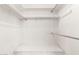 Spacious walk-in closet with ample shelving and hanging space for optimal storage at 2421 E Del Rio Dr, Tempe, AZ 85282