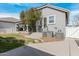 This backyard features a well manicured lawn and a patio area perfect for outdoor entertaining at 2701 E Hobart St, Gilbert, AZ 85296