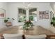 Cozy dining room with a rustic table, modern lighting, and charming decor at 2701 E Hobart St, Gilbert, AZ 85296