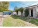 Charming home exterior with grass, a paved walkway, and a blue van parked nearby at 2701 E Hobart St, Gilbert, AZ 85296