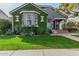 Charming home with lush landscaping, a gray stucco exterior, and inviting curb appeal at 2701 E Hobart St, Gilbert, AZ 85296