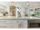 Elegant kitchen island featuring marble countertop and pendant lighting at 2701 E Hobart St, Gilbert, AZ 85296