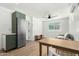 Well-lit living space with stainless steel appliances, butcher block countertop, and a comfortable couch at 2701 E Hobart St, Gilbert, AZ 85296