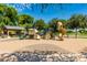 Playground featuring slides and structures for recreation; also a gazebo for resting and a basketball court at 2701 E Hobart St, Gilbert, AZ 85296