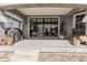 Spacious porch with stone columns, outdoor decor, and direct access to the backyard at 2701 E Hobart St, Gilbert, AZ 85296