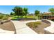 Picturesque walking path winding through lush greenery, creating a serene and inviting atmosphere at 2701 E Hobart St, Gilbert, AZ 85296