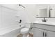 Clean bathroom featuring white fixtures and a combined tub and shower at 2818 W Eagle Talon Rd, Phoenix, AZ 85085