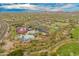 Aerial view of the community recreation center featuring a large pool, water slides, and sports facilities at 3419 W Thoreau Ln, Anthem, AZ 85086