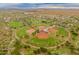 Aerial view of baseball fields and surrounding green spaces in the Anthem community at 3419 W Thoreau Ln, Anthem, AZ 85086