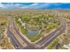 Aerial view of Anthem Community Park featuring lush landscaping, serene lakes, and Gathering-friendly amenities at 3419 W Thoreau Ln, Anthem, AZ 85086