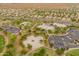 Aerial shot of a park featuring recreational amenities like a baseball field, basketball court, and skate park at 3419 W Thoreau Ln, Anthem, AZ 85086